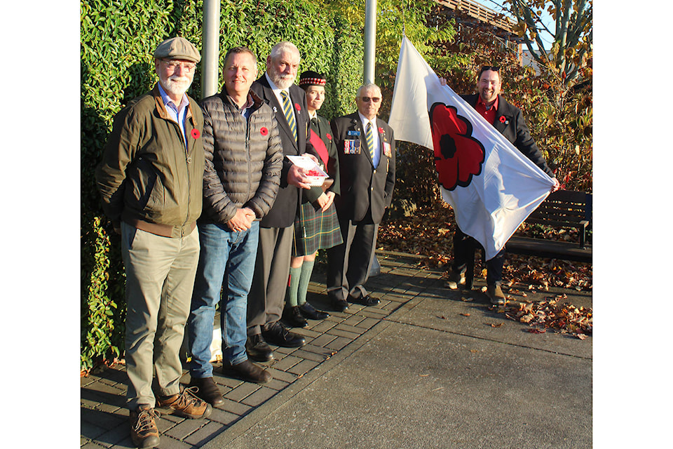 19114997_web1_191025-CVR-N-poppyflagpoppies