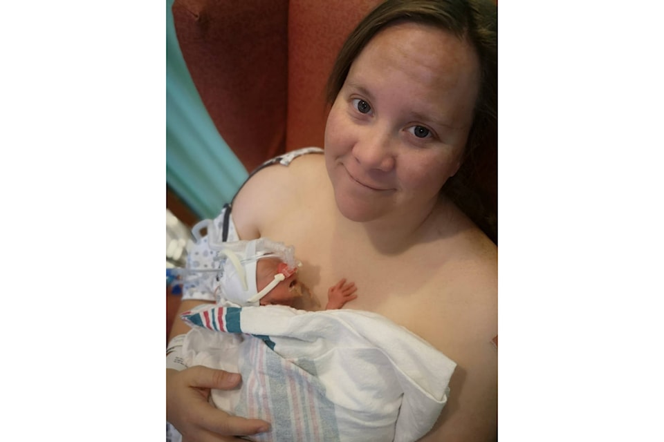 Mom Amber holds her baby son, Ephraim, who was one pound, 13 ounces at birth. Photo supplied