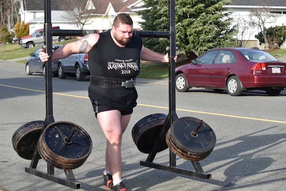 22828179_web1_200930-CVR-S-strongman-1_1