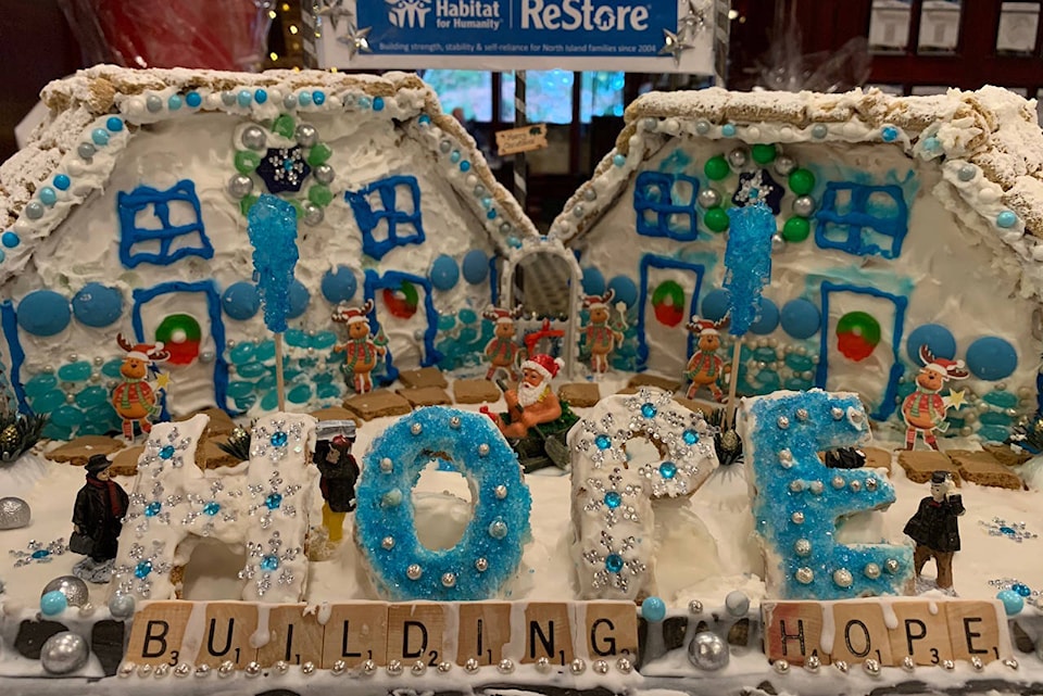 23443133_web1_201202-CVR-C-Gingerbreadvillage-1_1