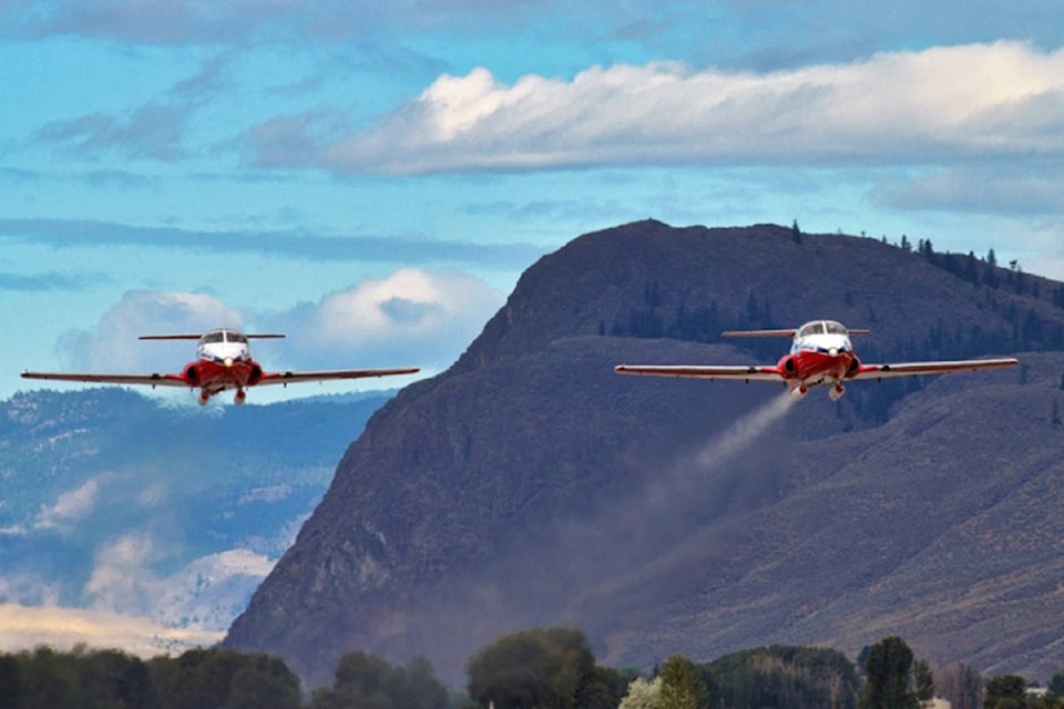 A pair of Canadian Forces Snowbirds CT-114 Tutor jets take off from Kamloops Airport on Tuesday morning. It marked the first time the iconic red ad white jets have been airborne since the May 17 crash in Kamloops that claimed the life of Capt. Jennifer Casey and injured the pilot, Capt. Richard MacDougall. The rest of the squadron’s planes will be flown to home base in Moose Jaw later this month. Dave Eagles/KTW