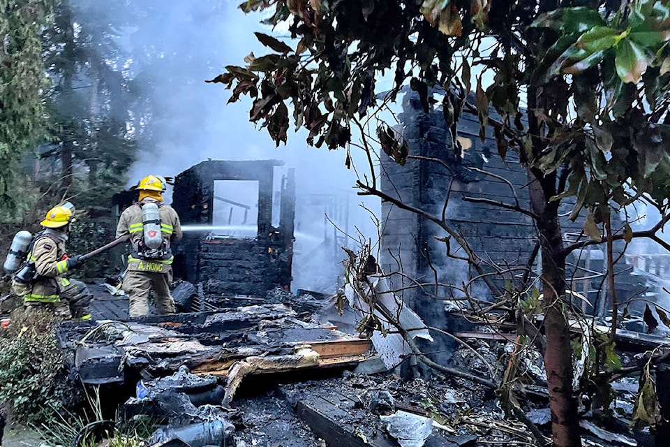 Firefighters attended the scene of a house fire early Jan. 14, 2021. The Parksville Fire Department, Coombs/Hilliers Volunteer Fire Department, Errington Fire Department, Nanoose Bay Volunteer Fire Department and the Qualicum Beach Fire Department were all in attendance. (Photo and video submitted by Skylar Gruys)