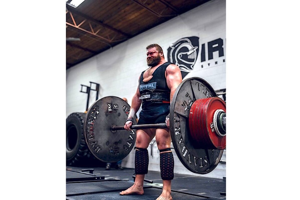 26965342_web1_211103-CVR-S-strongman-1_1