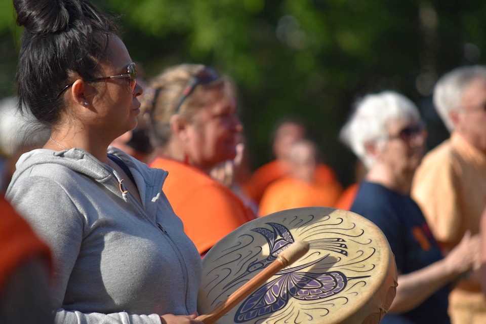 At Simms Millennium Park in Courtenay, a vigil was held on Monday (May 31) with more than 300 people in attendance to honour the remains of 215 children found buried on the site of a former residential school in Kamloops. Photo by Erin Haluschak