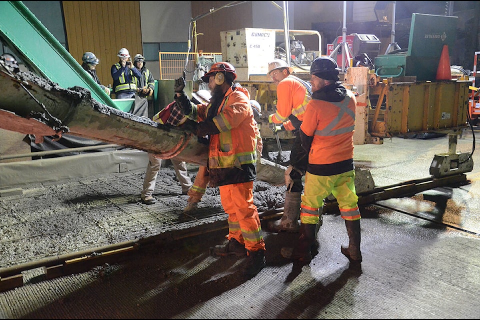The final pour on the 5th Street Bridge project got going on Friday night. Photo by Mike Chouinard