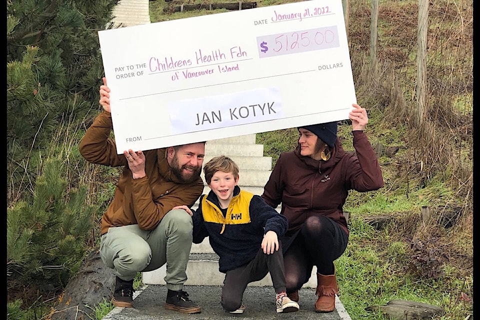 Jan Kotyk raised $5,125 for the Children’s Health Foundation by way of a 12-hour “stepathon” at the Goose Spit stairs. The Merville ultra-marathoner started climbing the stairs at 4 a.m. on Jan. 9 and continued until 4 p.m. For the most part, he would walk up and run down. He is pictured here at the Goose Spit stairs with his wife Erin and son Asher.