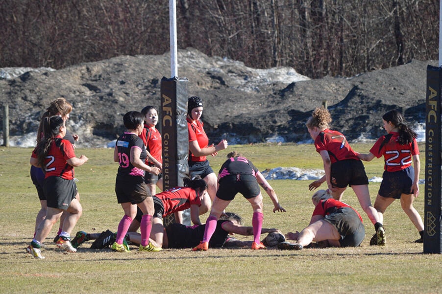 Hook Jade Baker scores one of her three tries in a BCRU Division II League game against Richmond/Delta at Cumberland Village Park. The Kickers won 55-15. Photo by Jesse Ramsay.