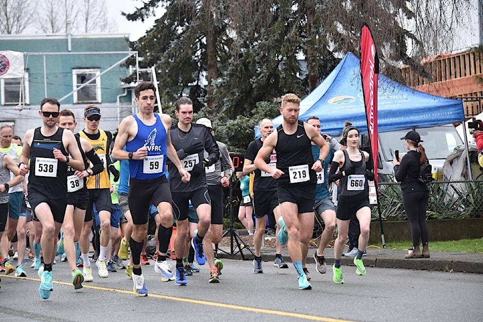 Pre-race favourite Trevor Hofbauer (#257) and the rest of the field embark on the Comox Valley RV Half Marathon, Sunday morning in Courtenay. Scott Stanfield photo