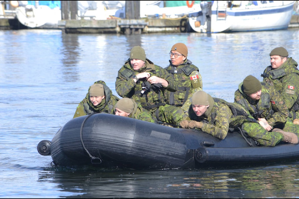 The army reserve personnel conduct boat training rehearsals at HMCS Quadra this weekend. Photo by Mike Chouinard