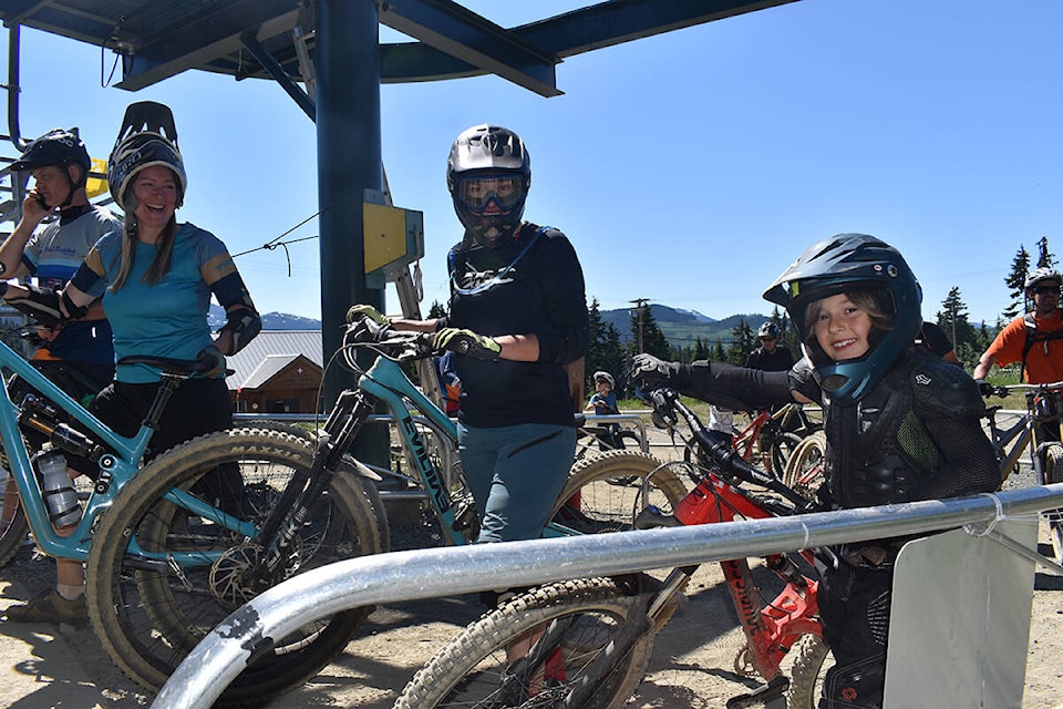 A family waits to load up onto the Hawk Chair at Mount Washington Bike Park. The bike park is open all summer long at Mount Washington Alpine Resort. Photo by Terry Farrell