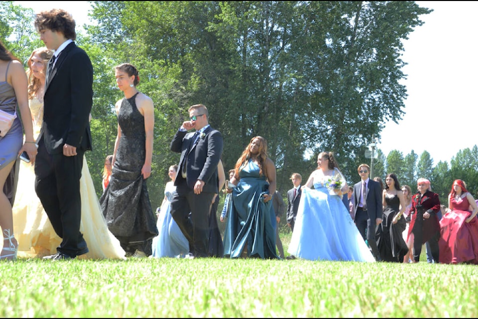 Vanier grads entered the commencement ceremony at the CVEX Grounds on Saturday. Photo by Mike Chouinard