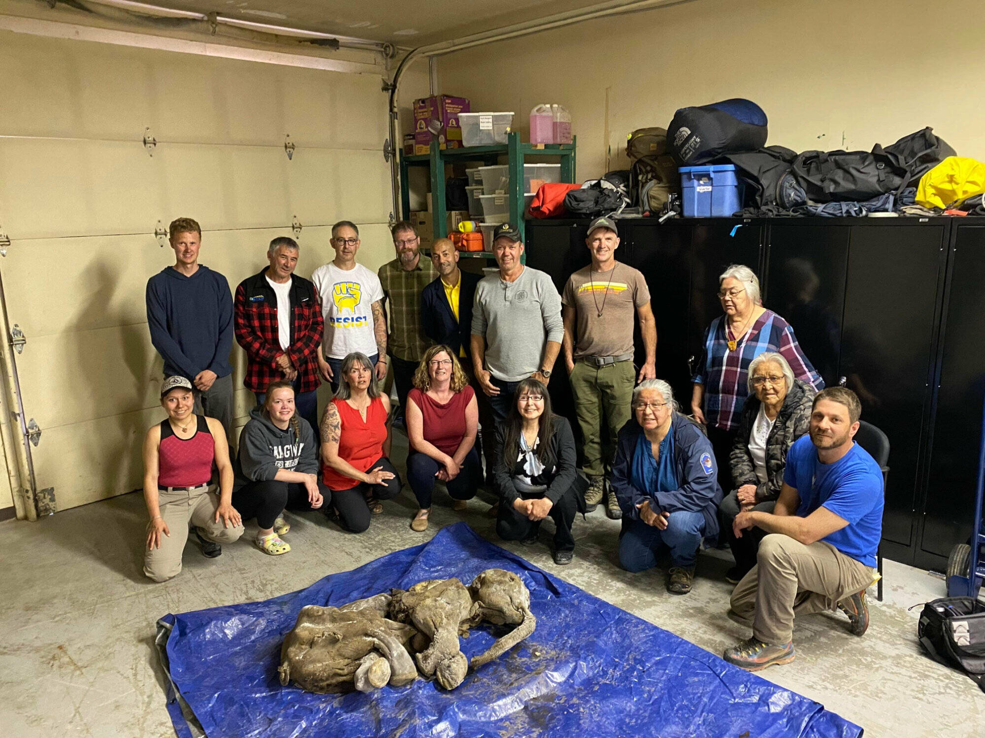 Members of Trʼondëk Hwëchʼin, Yukon Government, Treadstone Mine and University of Calgary with Nun cho ga. (Yukon Government/Submitted)