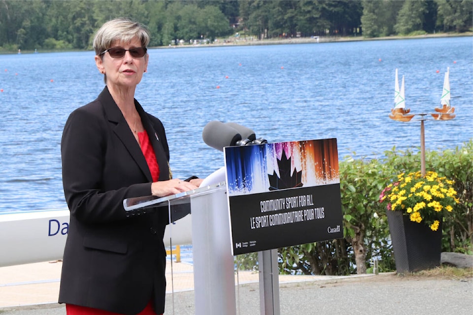 Rowing Canada Aviron president Carol Purcer speaks at Elk Lake in Saanich during an announcement of funding benefiting rowing programs on Tuesday (July 5). (Don Descoteau/News Staff)