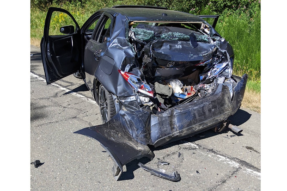 This Toyota sedan was rear-ended by a pick-up on Highway 19A Sunday (Aug. 7) afternoon at the Gumboot Market in Merville. Photo by Christy Vandon