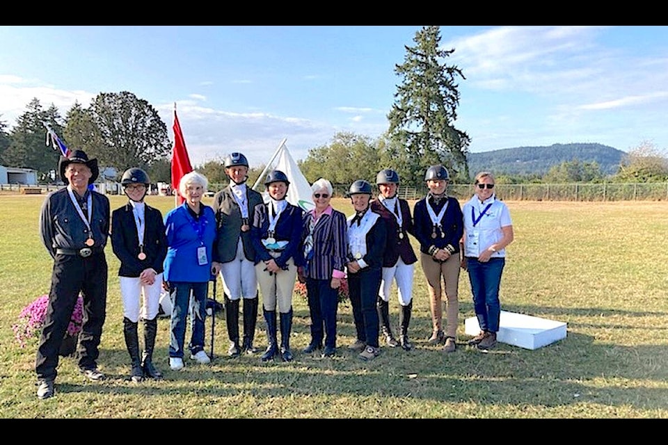 Zone 2 English and Western dressage medalists and officials: Gerry Person, Black Creek; Lee Hart Delaney, Merville; Equestrian Sport Chair, Sheila Skene, Victoria; Christal Quinn, Courtenay; Teg Harper, Black Creek; Dressage Judge Cara Whitham, Ont.; Nancy Garner, Courtenay; Heather Wade, Port McNeil; Sheila Watt, Courtenay; and volunteer equestrian co-ordinator Catherine Davidson, Black Creek. Photo supplied