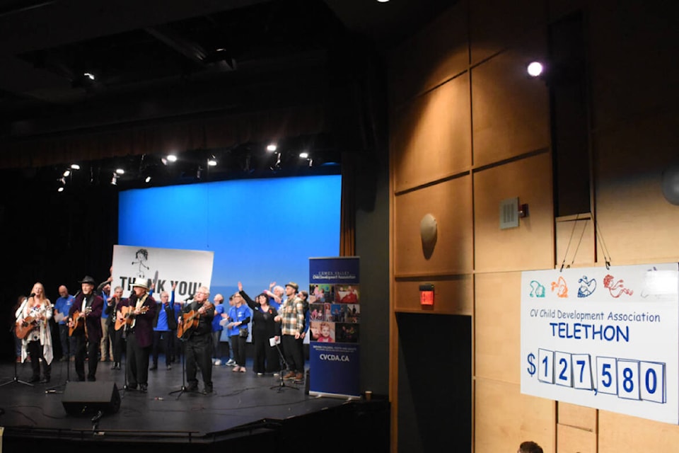 Entertainers and volunteers meet on stage to sing the finale “Do It For The Kids” at the end of the 47th annual Comox Valley Child Development Association Telethon. This year’s total was the third highest in its 47-year history. Photo by Terry Farrell