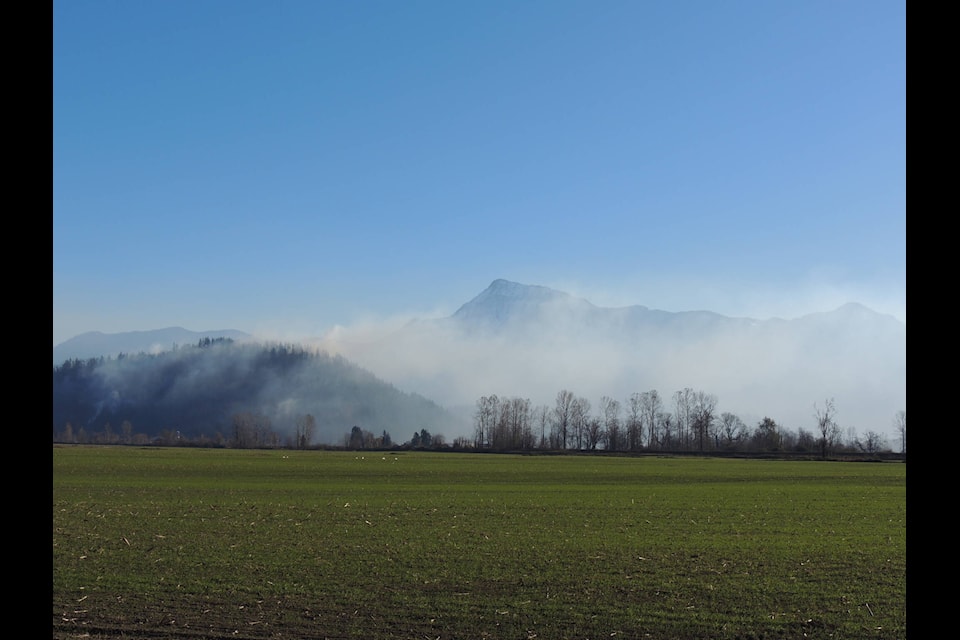 Smoke can plainly be seen and smelled in the Agassiz-Harrison Mills area as two late-season wildfires burn. (Adam Louis/Observer)
