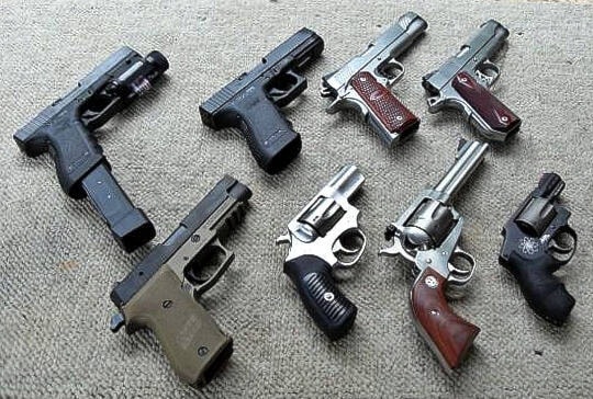 31327654_web1_handguns-P