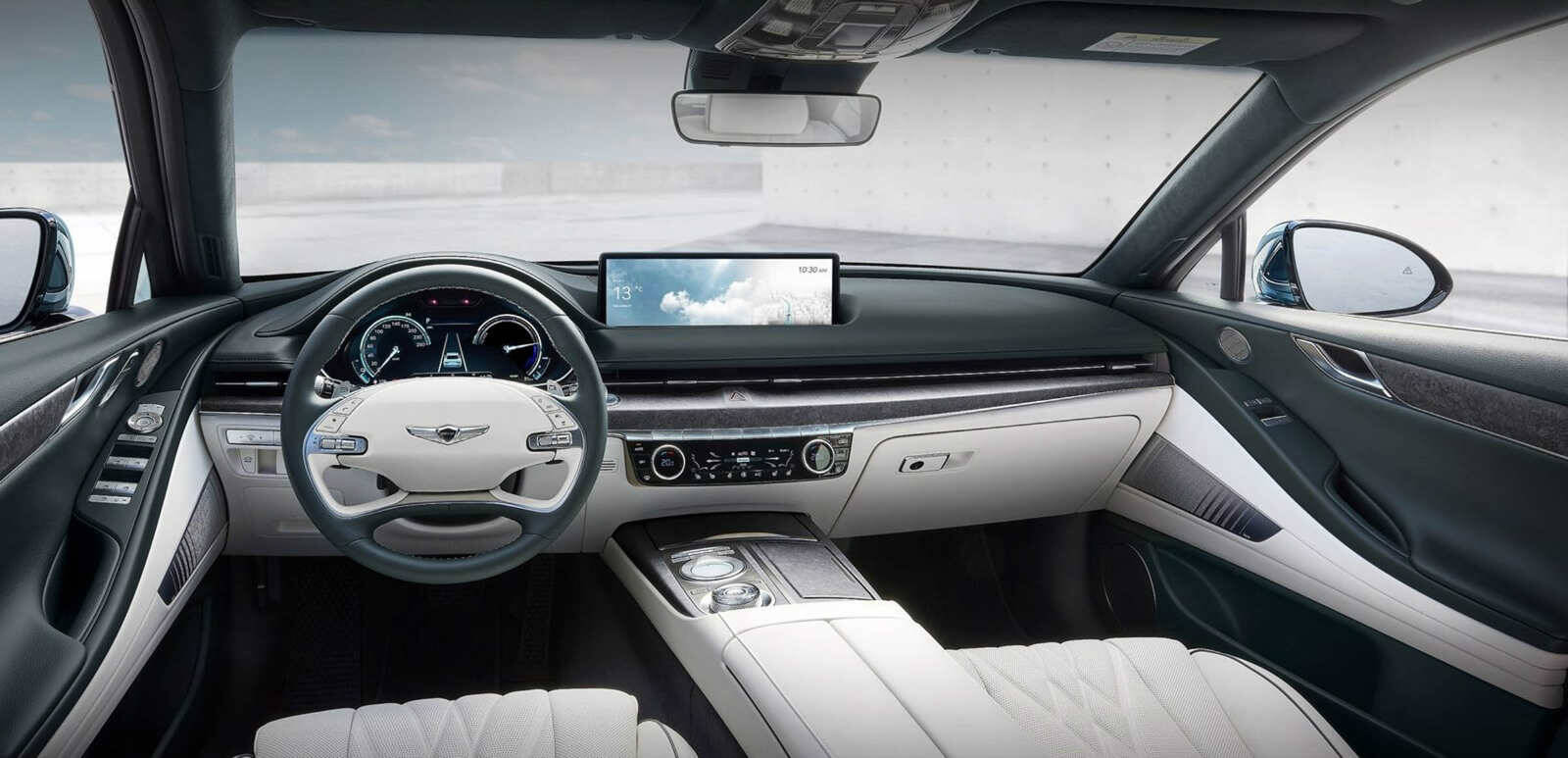 Occupants are treated to supportive Nappa leather seats along with wood-and aluminum-trimmed dashboard and door panels. PHOTO: GENESIS