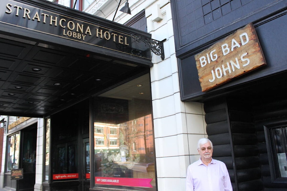Joel Chudleigh, Strathcona Hotel and Sticky Wicket’s sales and catering manager outside the property on January 24, 2023. (Brendan Mayer/News Staff)