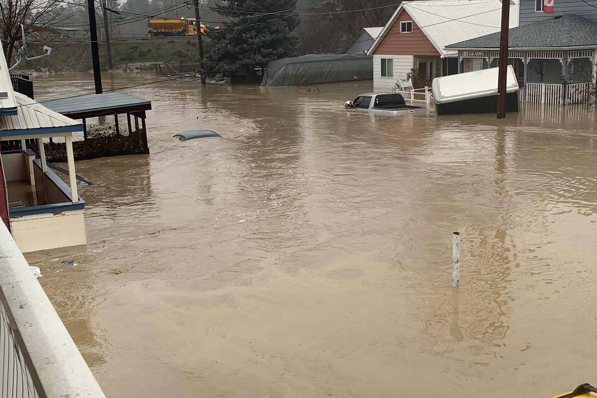 Sam Pereras new home, purchased just 29 days before the flood, was directly in the path of the raging waters. His home, with the white and brown siding, is shown here one day later. (Andrea DeMeer/The Similkameen Spotlight)