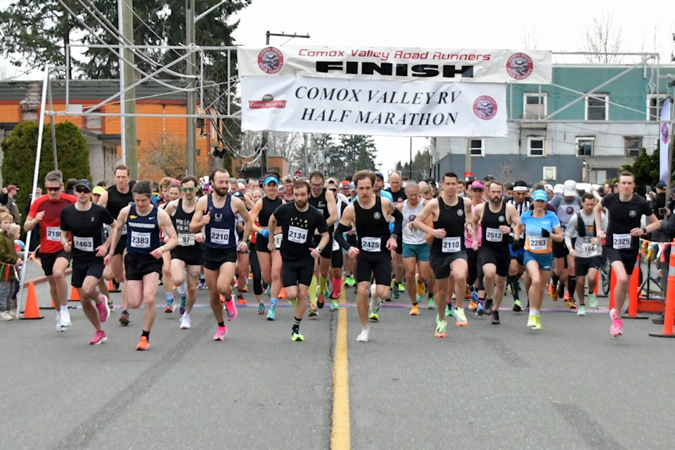 Jackson Bocksnick (2134) is at the head of the pack in the mass start of the 2023 Comox Valley RV Half Marathon. Photo courtesy JoeCrazyLegs