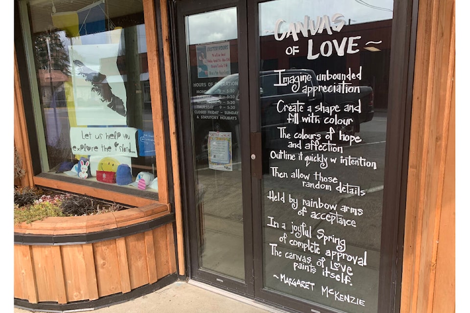 Margaret McKenzie’s poem, ‘Canvas Of Love’ graces the front door of Hitec Brazen Sportswear. Photo by Terry Farrell