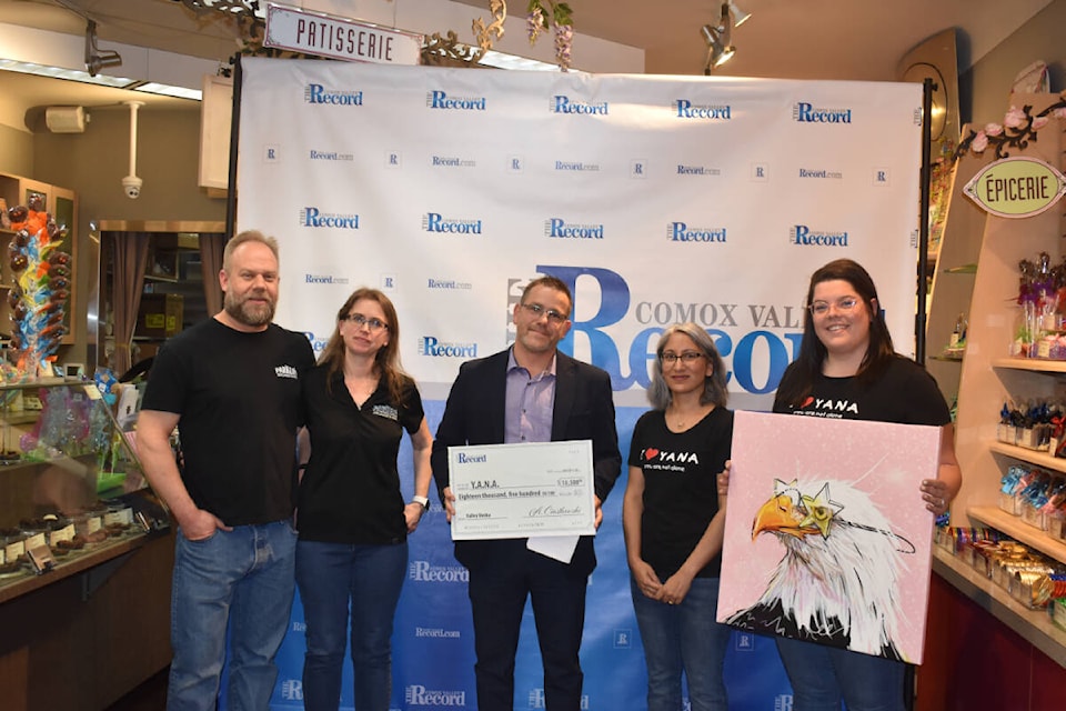 Comox Valley Record editor Artur Ciastkowski, along with Dustin Parker and Lisa Kennelly from title sponsor Parker’s Appliance, presents Shomila Bakshi and Kourtney Van Velzen of YANA with a cheque for $18,500 - that amount raised through chocolate bar purchases at this year’s YANA Valley Vonka event.