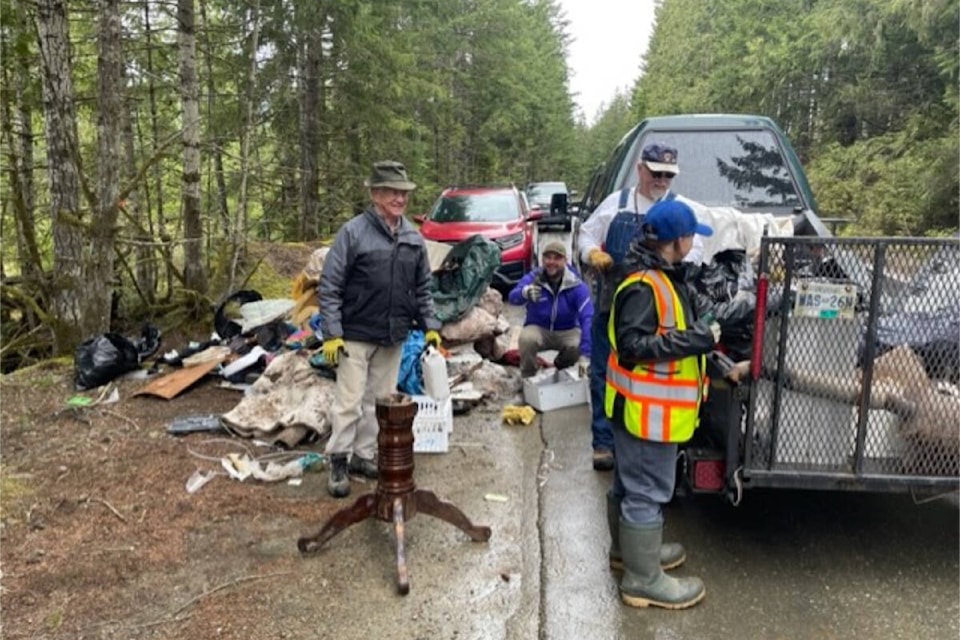 Volunteers load up everything from matresses to table pedestals during the 2023 Courtenay and District Fish & Game Protective Association spring clean-up, along the back roads of the Comox Valley. Photo supplied.