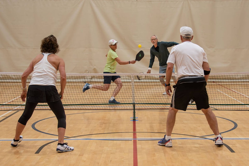 Action from a mixed doubles game at the Comox Valley Pickleball Association’s Sixth Annual Pickleball Tournament held at the Canadian Forces gymnasium in Comox on May 6 and 7.
