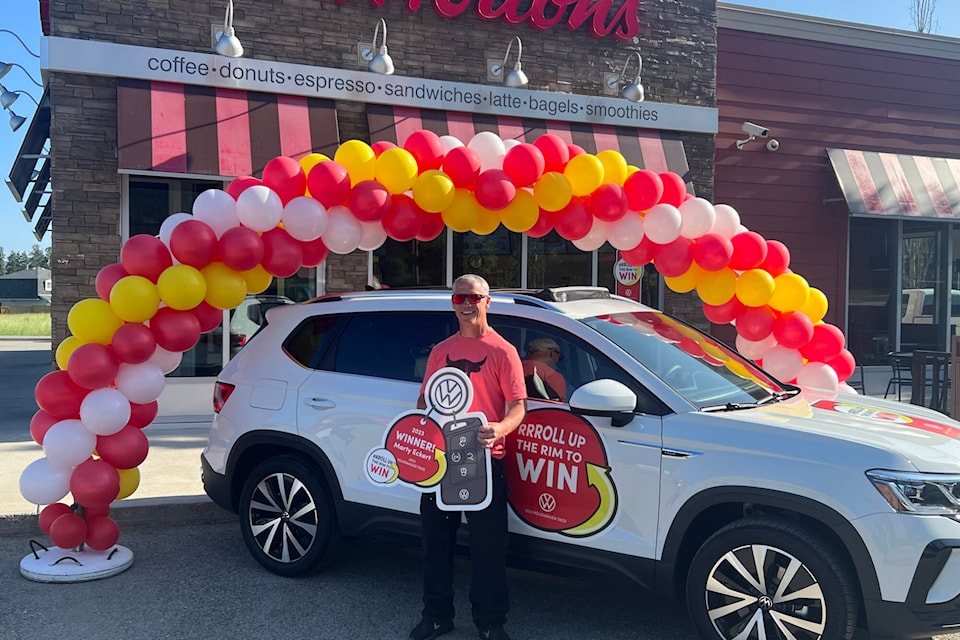 Armstrong’s Marty Eckert was handed the keys to his new Volkswagen Taos Wednesday, May 31, 2023. Eckert won the car through Tim Hortons’ Roll Up the Rim to Win contest. (Brendan Shykora - Morning Star)