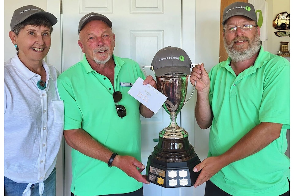 June 23/24/25 Connect Hearing Classic Men’s Pairs in Courtenay L-R: Sandy Tonnellier presents the trophy on behalf of Connect Hearing to Brian Scherr and Dean Penny