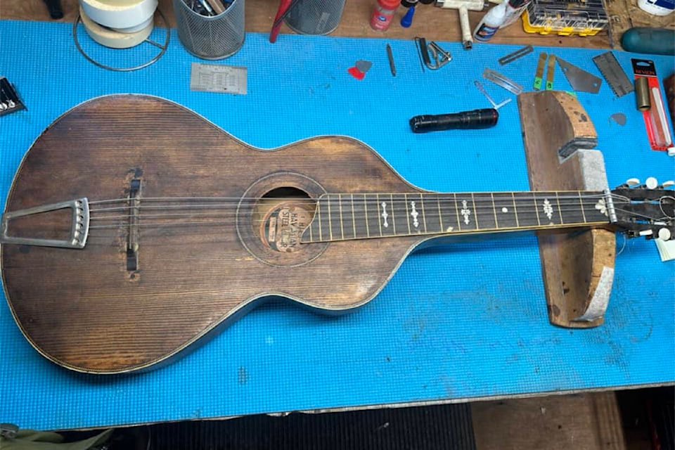 Century old guitar found at Courtenay thrift store set to make its