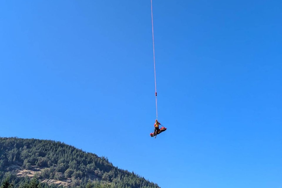An injured mountain biker had to be airlifted to a waiting ambulance by rescuers in the Shawnigan Lake area on Aug. 3.