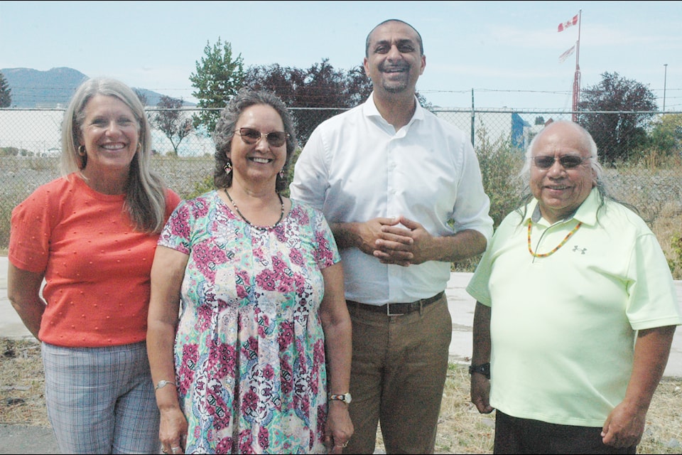 Construction will begin in late summer or early fall on a new four to six-storey, 199-unit rental complex that will be constructed on reserve land owned by Cowichan Tribes at 222 Cowichan Way in Duncan . Pictured, from left, is Renee Olson, CEO of Khowutzun Development Corporation, Cowichan Tribes Chief Cindy Daniels, B.C. Housing Minister Ravi Kahlon, and Cowichan Tribes Councillor Calvin Swustus at the site where the project will be built.