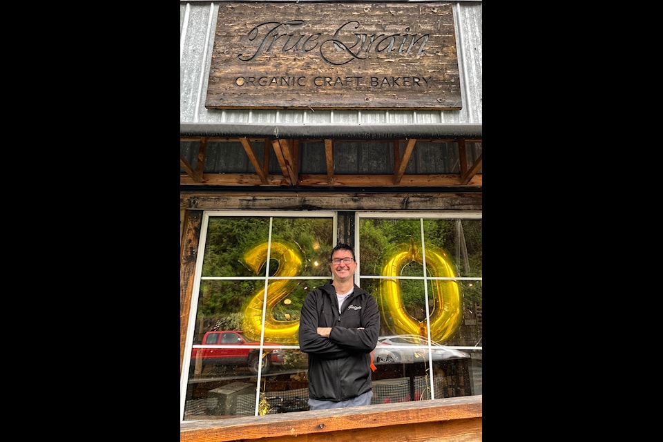 Cowichan Bay's True Grain bakery celebrated 20 years last month. Owner Bruce Stewart stands in front of his business, which marks the meaningful milestone. 
(Chadd Cawson/Connector)