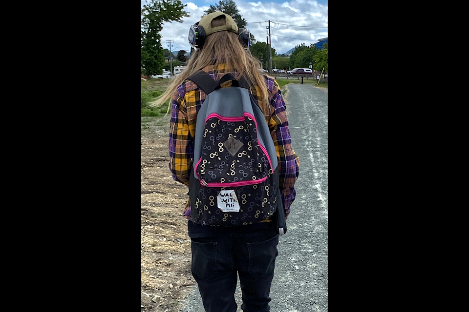 Christopher Hauschildt, who is the research administrative coordinator with the 'Walk with Me' initiative that was first formed in 2019 led the way as over 30 guests had the rare opportunity to walk the streets and neighbourhood of downtown Duncan on June 11 while listening to personal stories  of those with lived experience of the rising toxic drug crisis.  