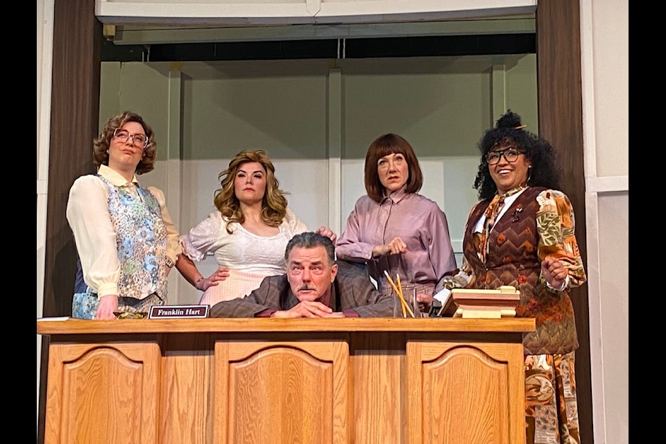 Mr. Hart (W. Joseph Matheson) has his head on his desk, and his work cut out for him, as he gets a taste of the personalities of the working women in his office who exhibit some much needed girl power to put Hart in his place. Sarah Carlé Owen (left), Jennie Neumann, Stephanie Roth, and Ali Watson stand behind their boss as they cleverly think of ways to get in front of him.