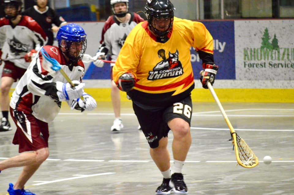 The Thunder's Julian Johnny collects the ball during Cowichan's 9-7 loss to the Westshore Aces on June 8 at the Cowichan Arena.