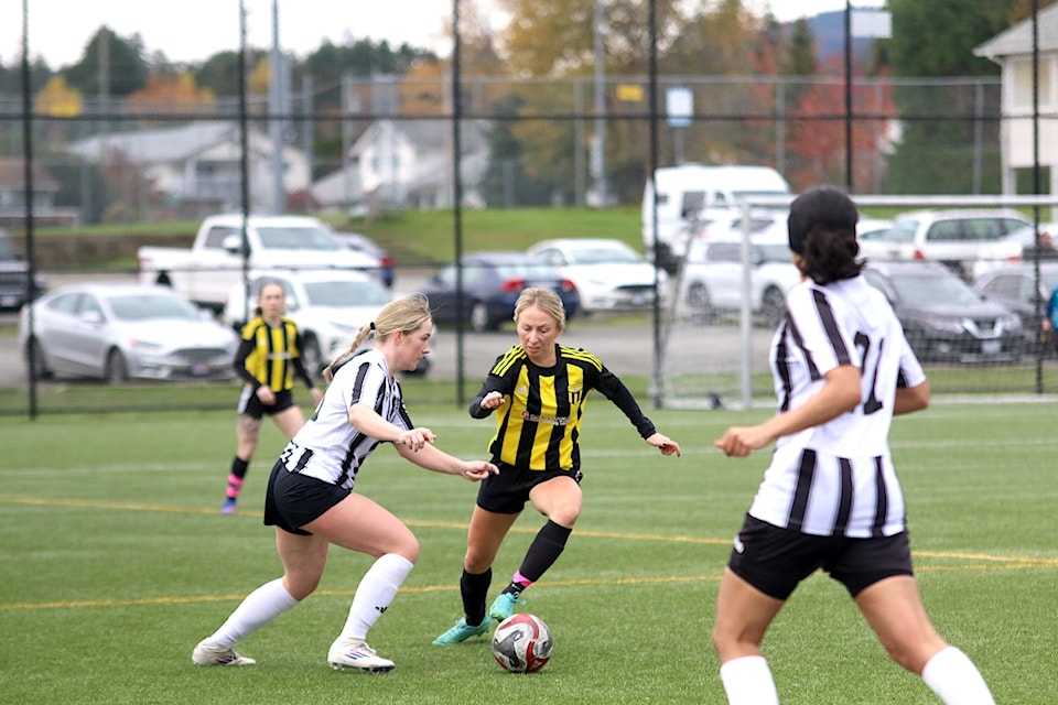 Cowichan's Brogan Boyer fights for possession of the ball during a 2-1 loss to Gorge FC at the Sherman Road turf on Sunday, Nov. 3.