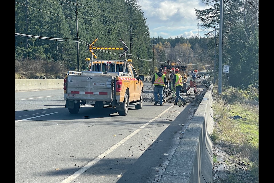 Crews are at work cleaning up considerable debris from high winds along the Trans-Canada Highway from Fuller Lake Arena to beyond Country Maples on Monday, Nov. 4.