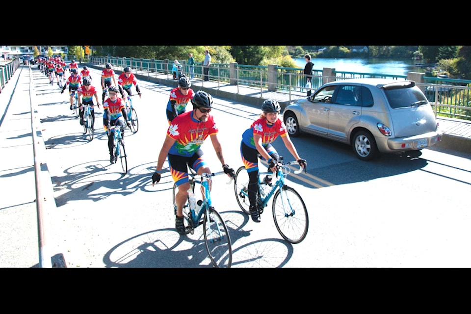 "Tour de Rock riders roll through Lake Cowichan Tuesday. The riders will wrap up their 1,000-kilometre trek to raise funds for pediatric cancer research on Friday in Victoria."