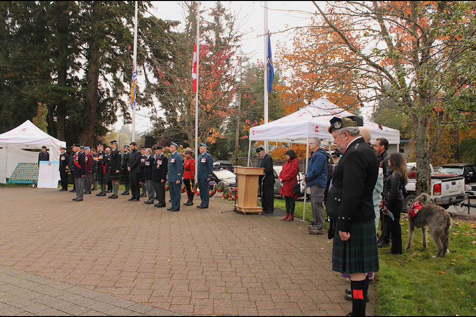This past Oct. 22 marked 10 years that a vigil has been held at at the Cobble Hill Cenotaph to honour all those who lost their lives on Canadian soil in non-combat situations. Retired Canadian military personnel and vigil organizer Robert Collins stands far right in his kilt. 