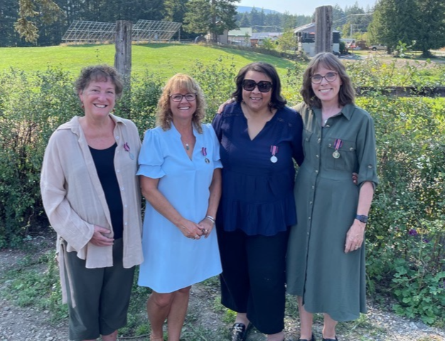 Four champions of our community were honoured with the King Charles III Coronation Medal at Alderlea Farm on Sept. 6.  Lori Treloar (l), Cindy Lise, Fatima Da Silva, and Sonia Furstenau pose with great pride and humility wearing their royal recognition for their outstanding work in the community.