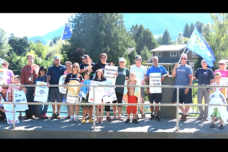 "Members of the Lake Cowichan Teachers’ Association conducted a rally last Friday as the ongoing teachers strike continues. Teachers at the lake want the provincial government to make a decision on binding arbitration." 