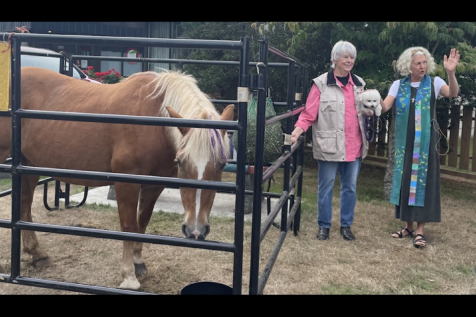 Rev. Elise Feltrin presides over the Blessing of the Animals Service in 2023.