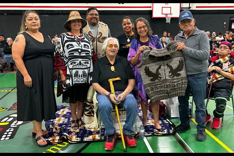 A special ceremony was held inside the the Siem Lelum Gym in Duncan on Sept. 14 to honour the leadership and achievements of recently retired Lyackson First Nation Chief Pahalicktun, Richard Thomas. 
Members of Cowichan Tribes presented Chief Pahlicktun (seated, centre) with gifts that included a custom-designed Cowichan sweater vest. Councillor Jen Phillips (l), Chief Cindy Daniels, Councillors Troy Elliot, Terri Allen, and Fran Alphonse, and Elder Joe Charlie. Lyackson, and speaker John George is seated far right.