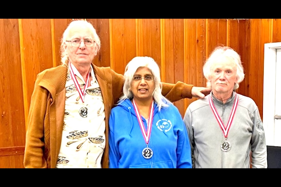 Bert Lambert, Petey Sahay, and Gary Goodfellow of Honeymoon Bay placed second in the Triples event.