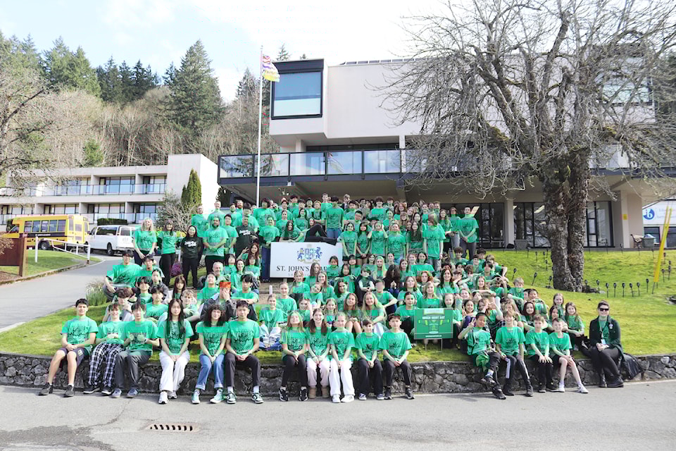 Parents, students and staff of St. John's Academy all don green shirts. The school's inaugural celebration of Green Shirt Day  took place on April 2, five days early in support of national 'Green Shirt Day' which is recognized across the country on April 7 in support of, and to raise awareness around organ donation. (Submitted)