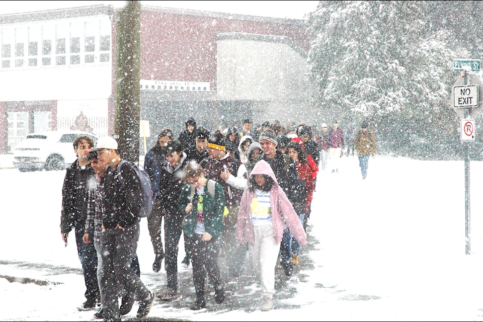 More than 1,000 students at the old Cowichan Secondary School packed up and headed to the new Quw'utsun Secondary School during a snow storm on Feb. 3. (Robert Barron/Citizen)